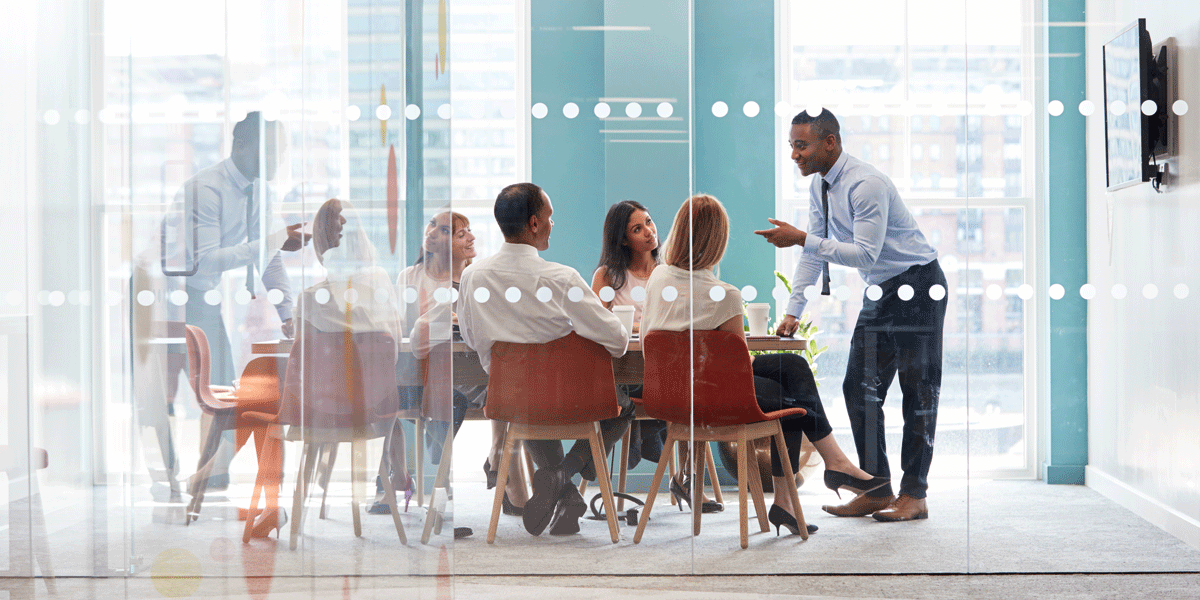 Meeting in office boardroom