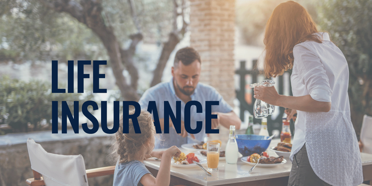 family of three enjoying lunch outside