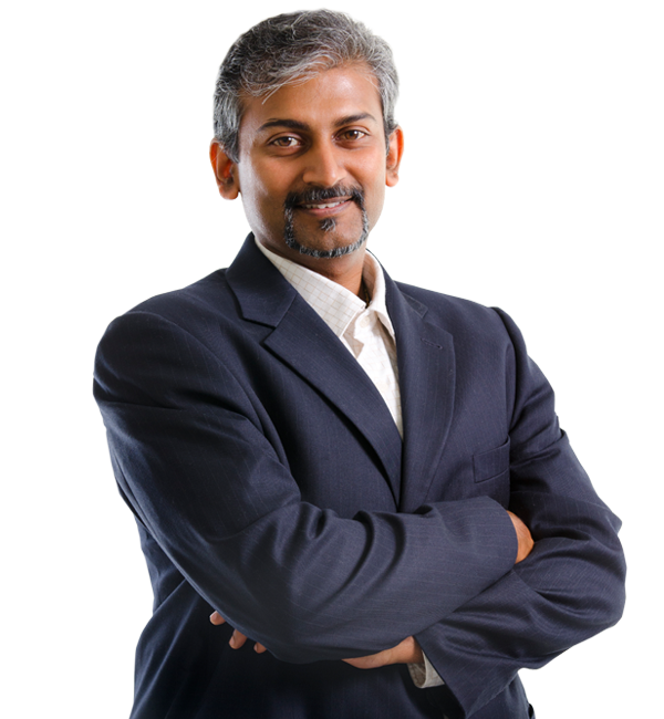 Happy looking man in a suit with arms folded